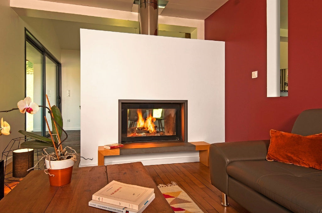 Fondis Ulys 900 Double Sided black inset stove with flames in a wall divider in a red-walled living room