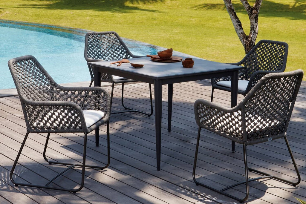 Skyline Design - Kona - 4 Seat Outdoor Dining Set with Serpent Table