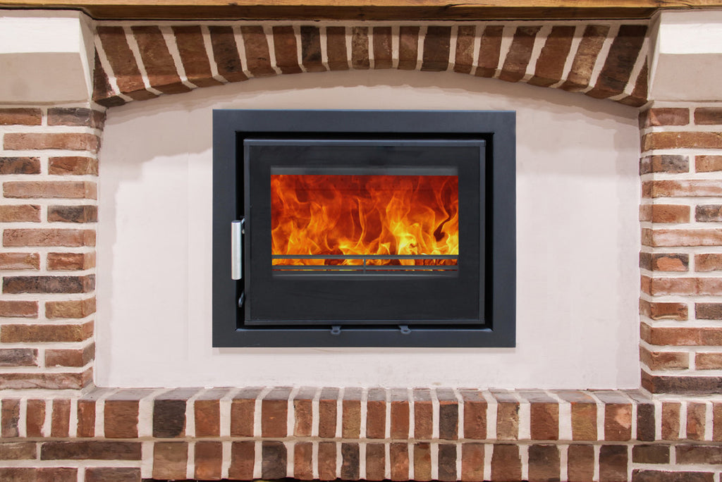 Woodford - Lovell C550 - 6.9kW Multi-Fuel Inset Stove with flames in a brick wall