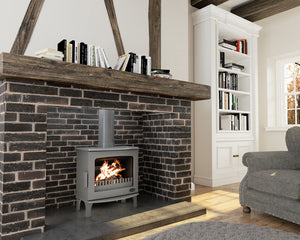 Carron - ECO Stove - 5kW Wood Stove (Multi-fuel Kit Option) - Ash Grey Enamel in a gray fireplace suite